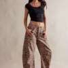 Free People Brown Sugar Combo Good Luck Printed Barrel Jeans